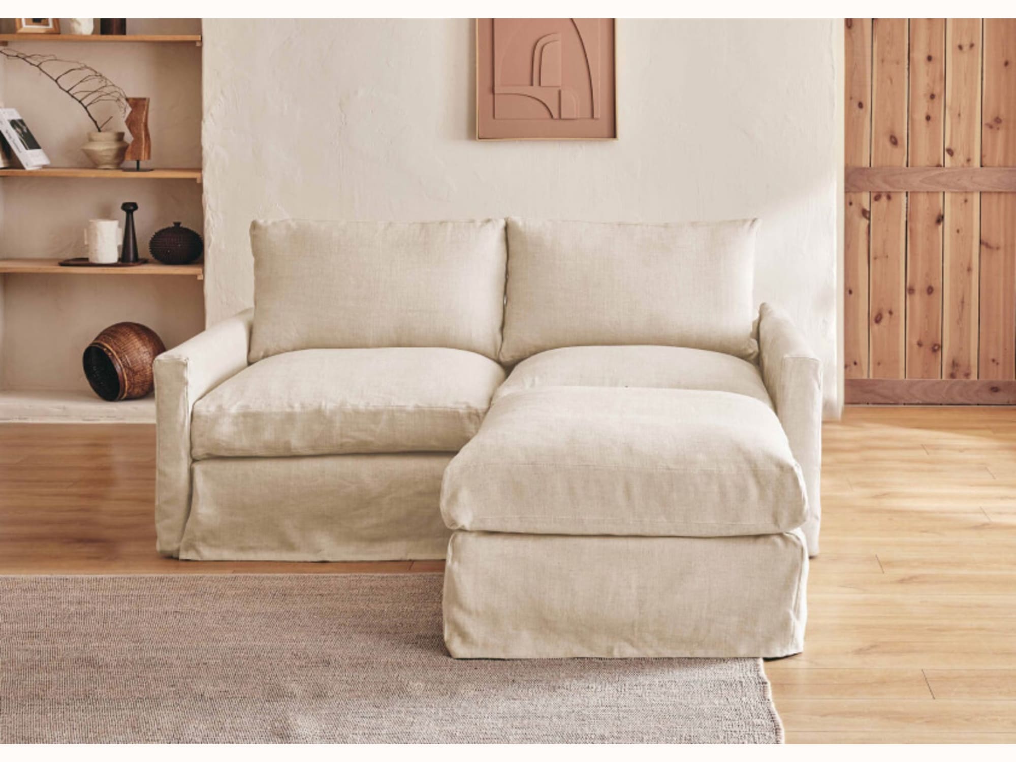 Divano angolare a 2-3 posti con pouf in lino LENO