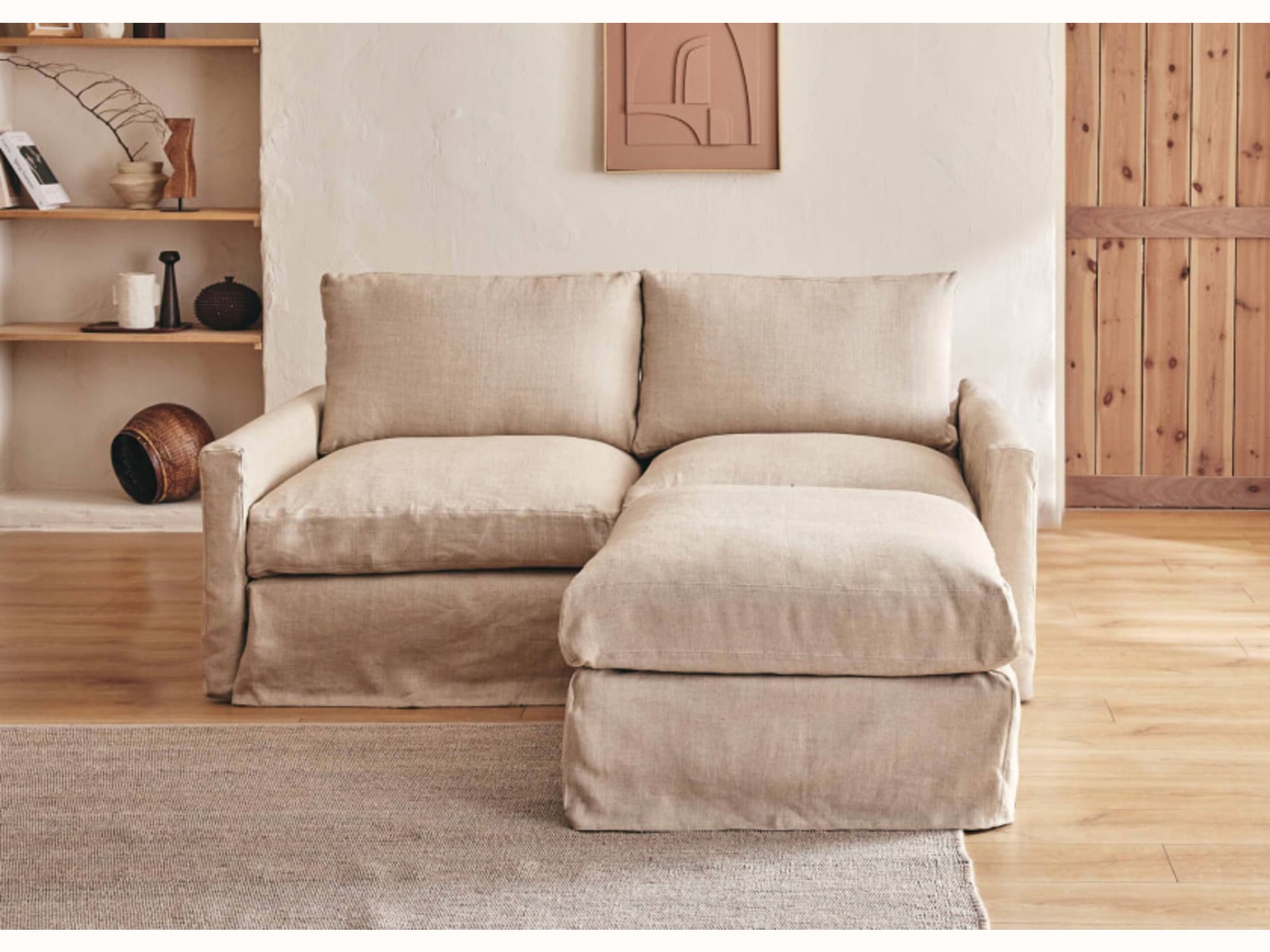 Divano angolare a 2-3 posti con pouf in lino LENO