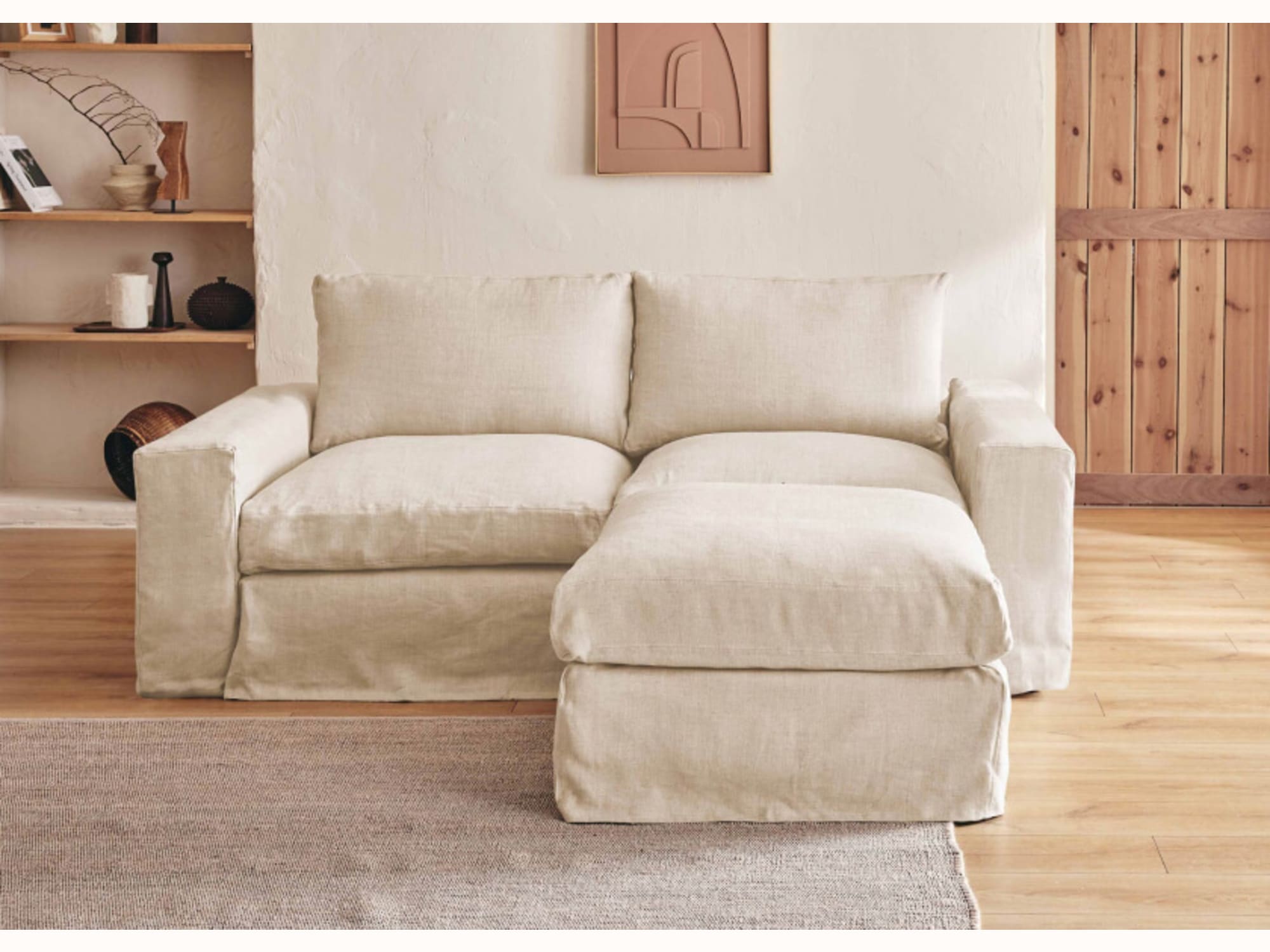 Divano angolare a 2-3 posti con pouf in lino LENO