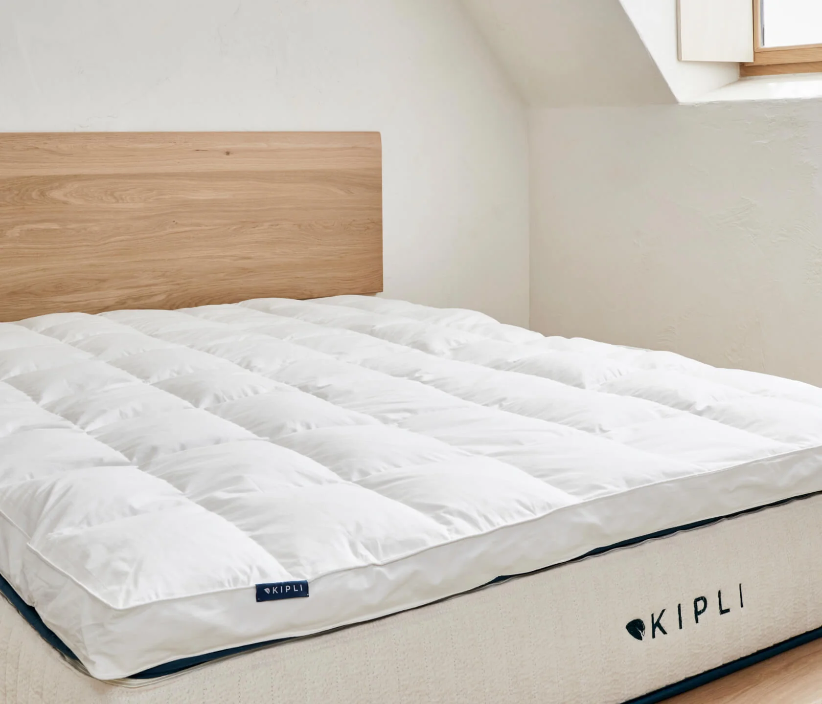 Topper in piuma e piumino